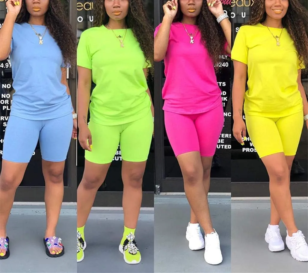 KINIKO Women's 2 Piece Casual Fashion Sports Solid Color Suit short Sleeve top and Pants Set Sweatshirt