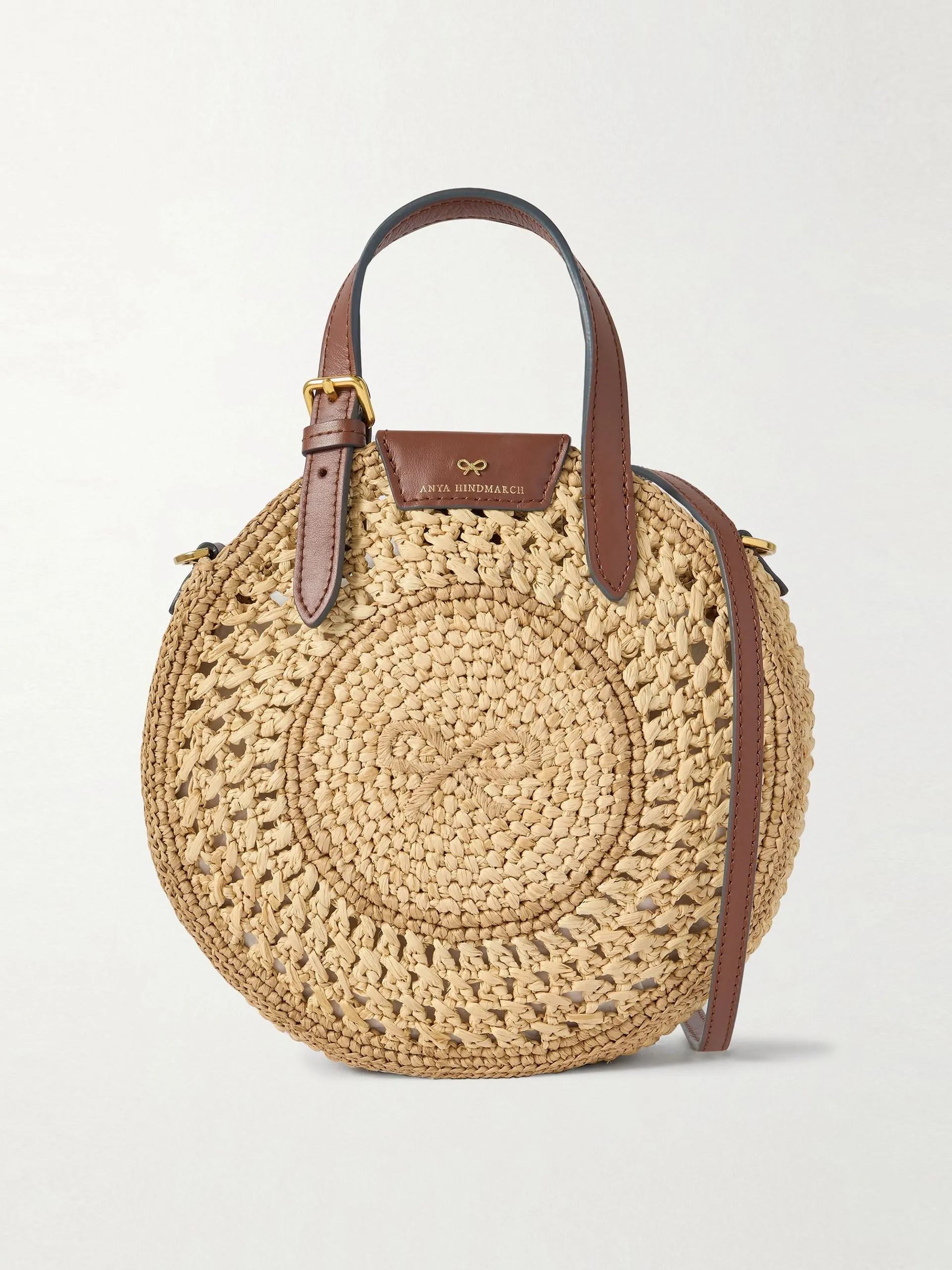 Small leather-trimmed crocheted raffia tote